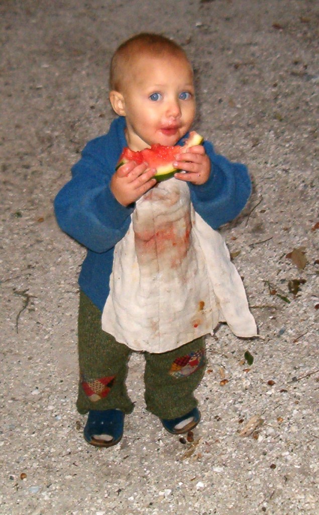 one year old eating watermelon